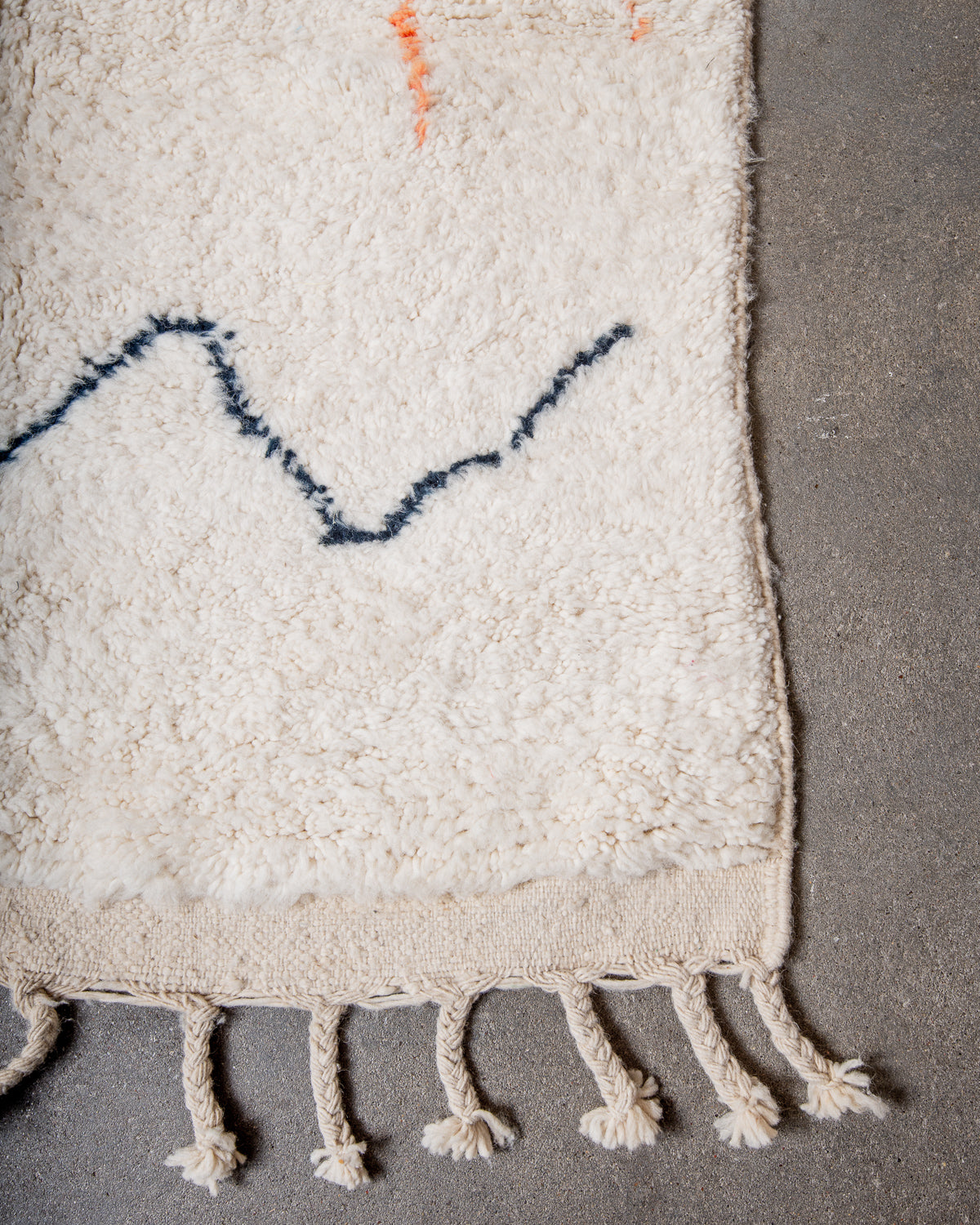Modern, designer, handcrafted Berber rug from Morocco. Beniourain carpet with beautiful colours and patterns and fluffy wool texture.